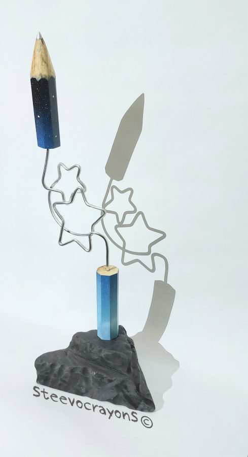 Il faut toujours viser la lune, car même en cas d'échec, on atterrit dans les étoiles. - Une citation d'Oscar Wilde. - Sculptures en fil de fer